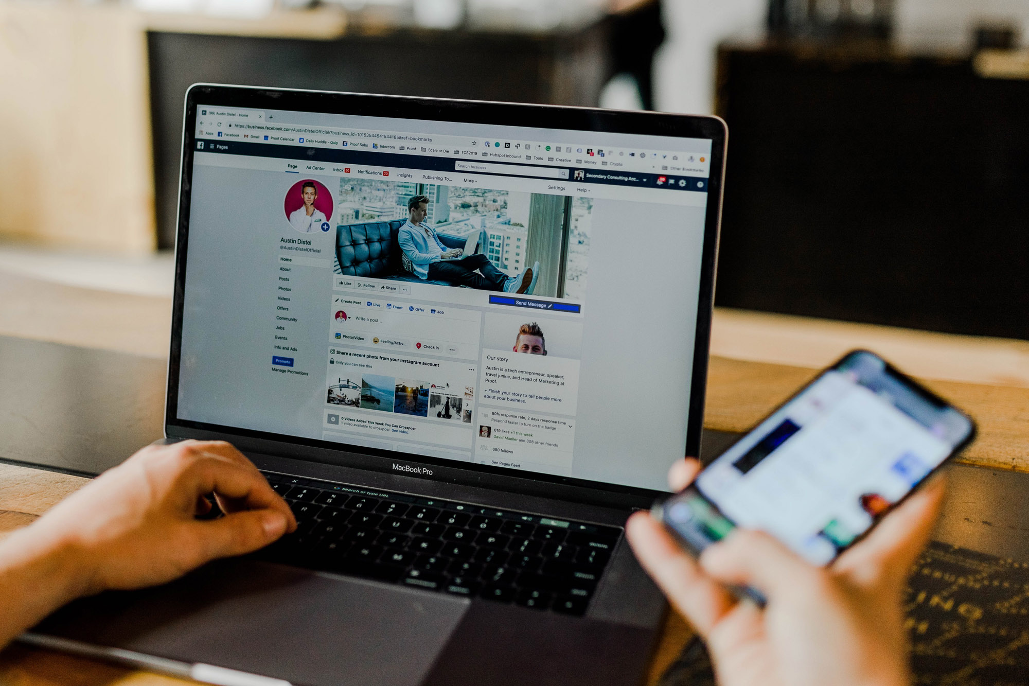 typing on laptop and phone Photo by austin distel on Unsplash